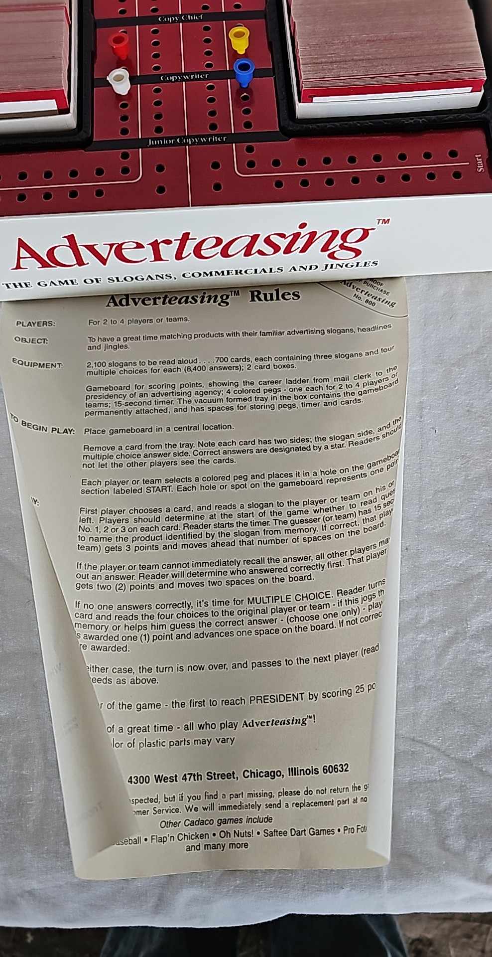 ADVERTEASING THE GAME OF SLOGANS,COMMERCIALS AND JINGLES VINTAGE 1988